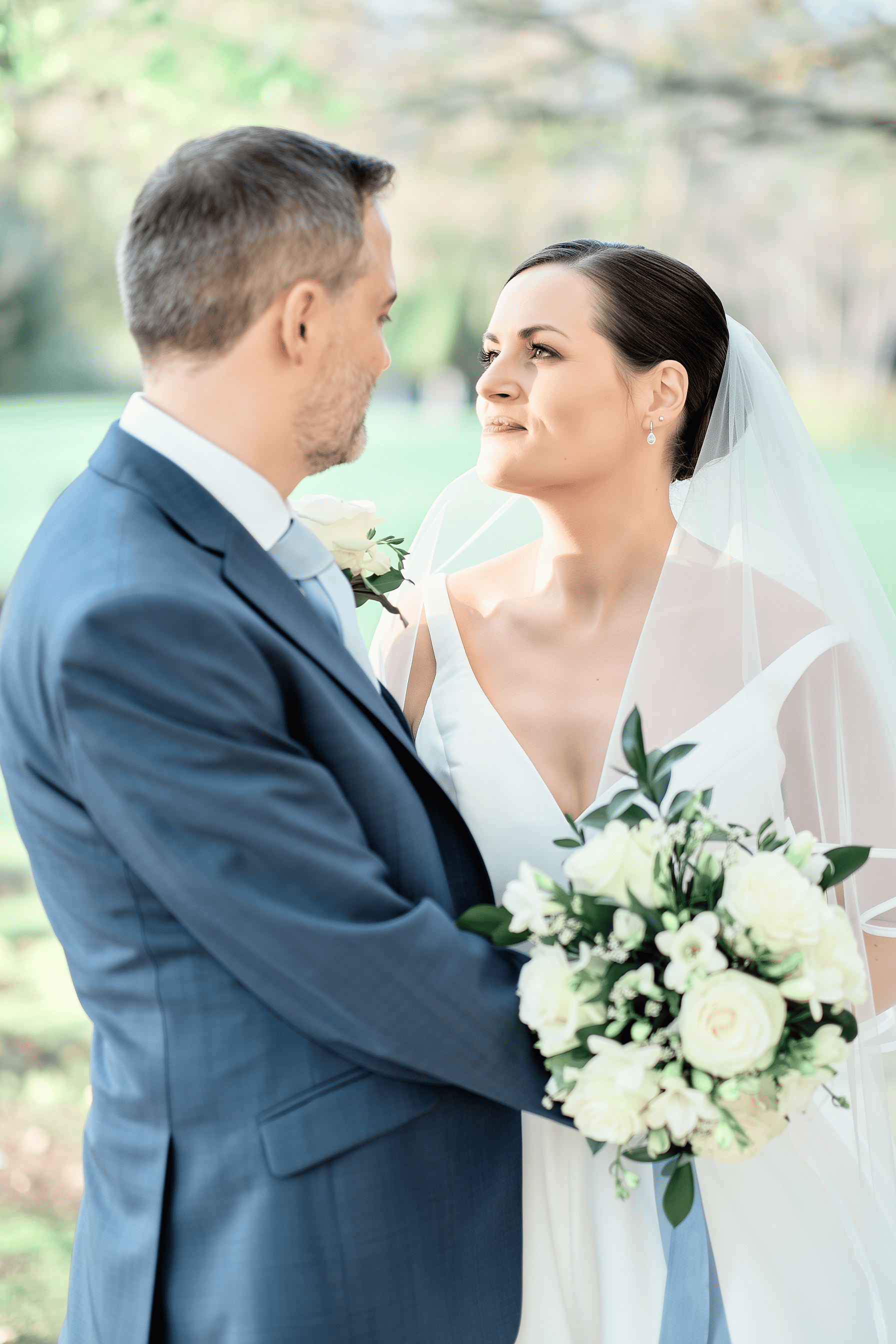 Natasha’s bridal portrait at Chilston Park Hotel featuring timeless bridal hairstyle and natural wedding makeup by Glamour Brides.
