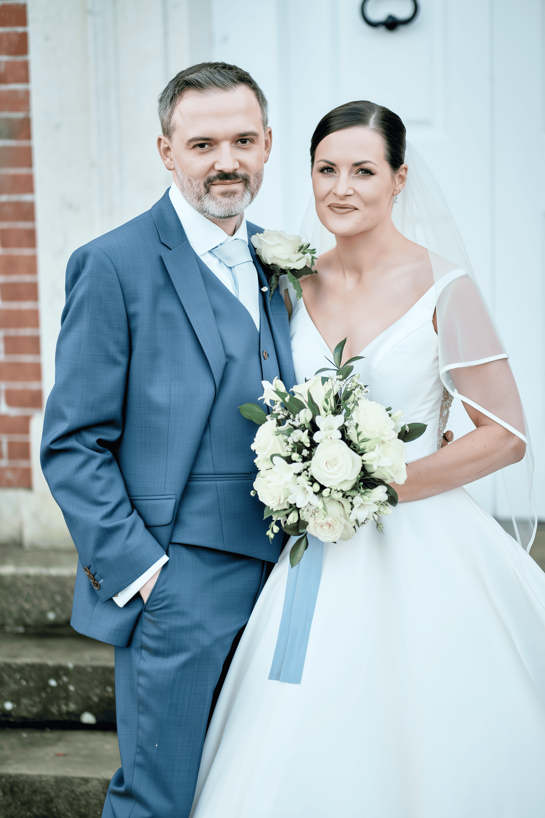 Natasha, bride at Chilston Park Hotel in Kent with elegant bridal hair and makeup styled by Glamour Brides.