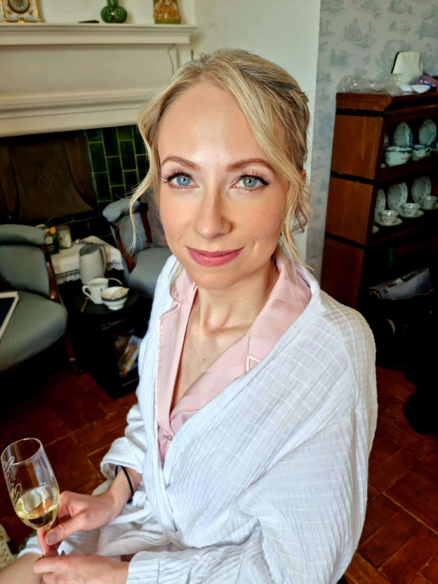 Stephanie’s Elegant Bridal Look at Bilsington Priory Stephanie at Bilsington Priory wedding venue with classic bridal hairstyle and radiant wedding makeup by Glamour Brides.