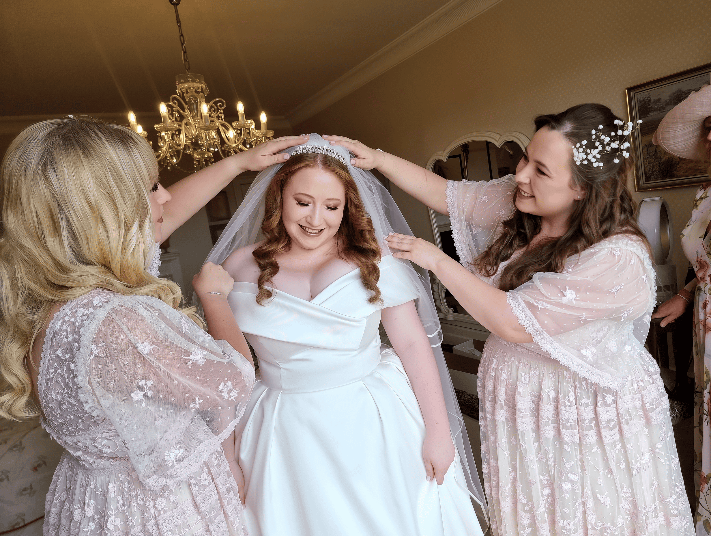 Amber, bride at Wadhurst Castle in East Sussex with elegant bridal hair and makeup styled by Glamour Brides.