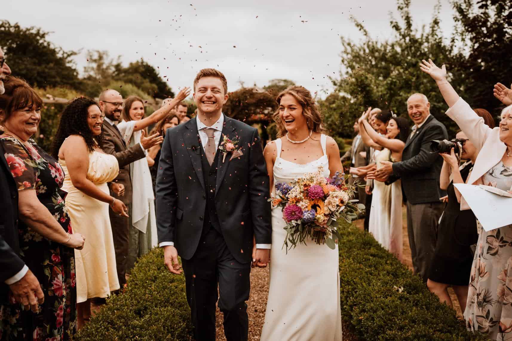 Celia’s Natural Bridal Hair and Makeup at The Secret Garden Bride Celia celebrating her wedding at The Secret Garden venue with elegant bridal hair and makeup by Glamour Brides.