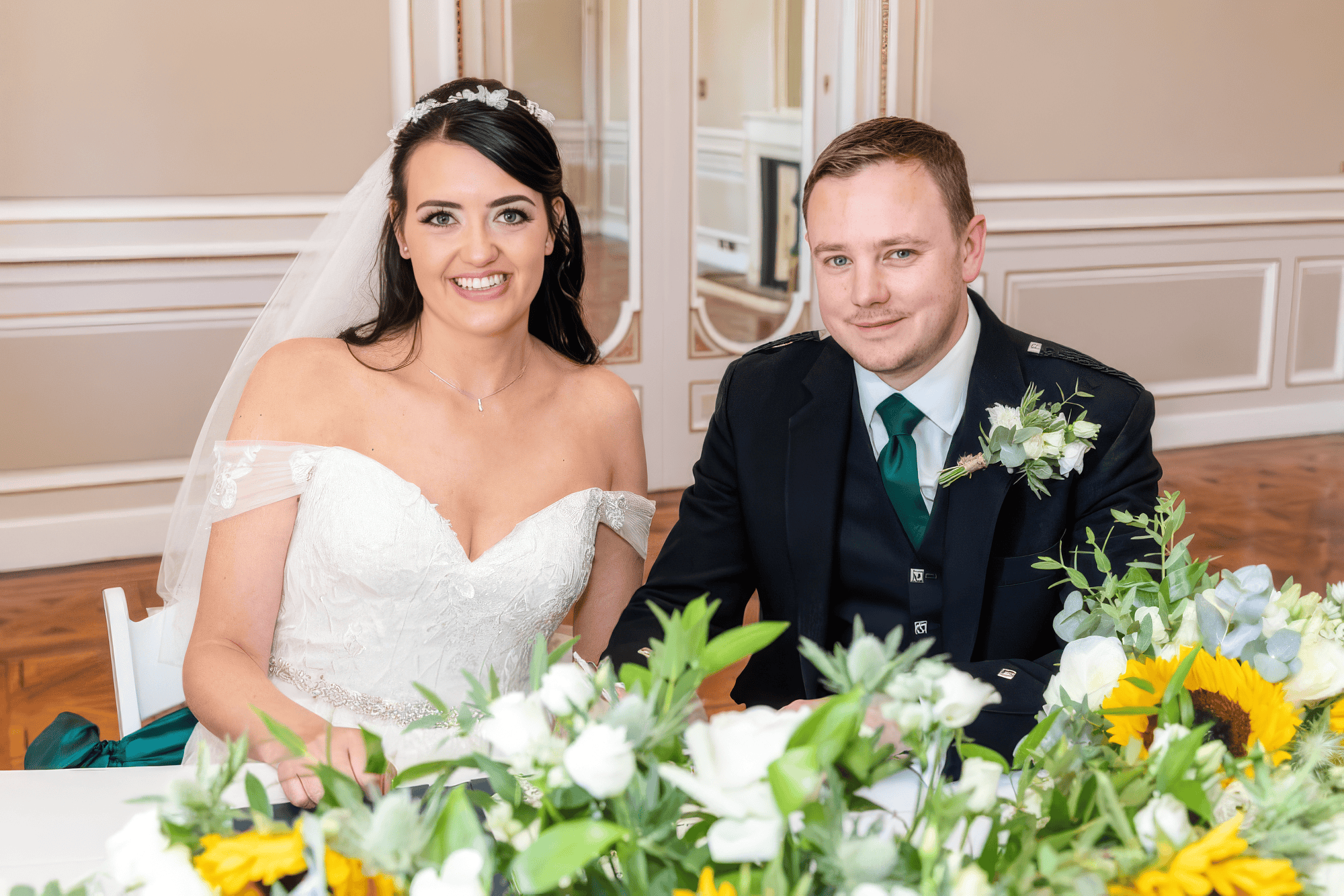 glamour-brides-claire-salomons-estate-kent-bride-getting-ready.jpg Bride seated by window in bridal gown during wedding morning preparations
